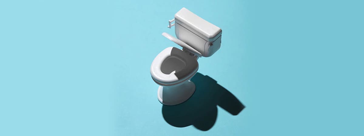 A toilet on a blue background